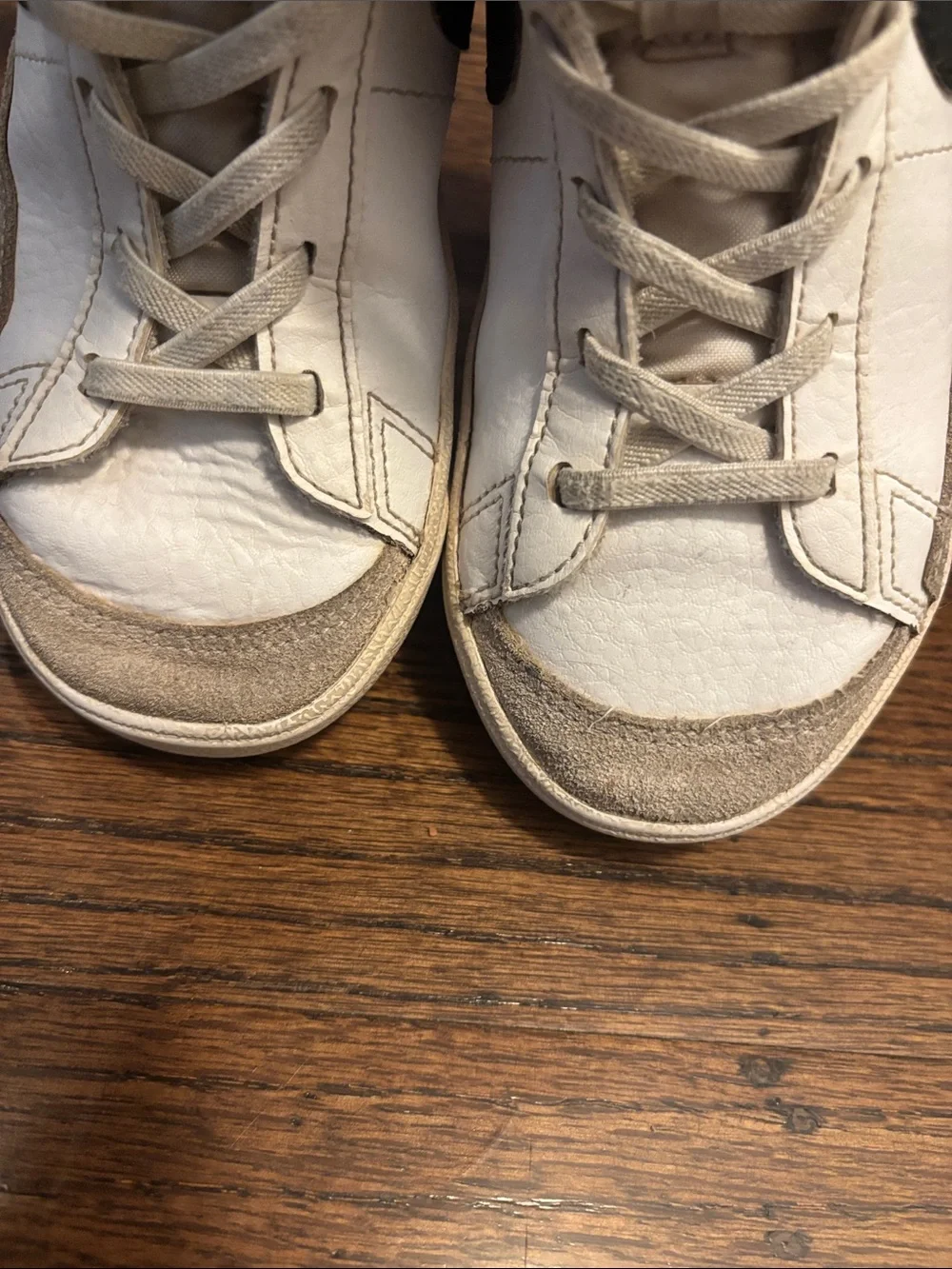 Nike Kids White and Black High-Top Sneakers with Orange Swoosh